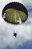An Armed Forces of the Philippines paratrooper wearing an MC1-C parachute descends through the sky Poster Print by Stocktrek Images - Item # VARPSTSTK102214M An Armed Forces of the Philippines paratrooper wearing an MC1-C parachute descends through the sky Poster Print by Stocktrek Images - Item # VARPSTSTK102214M