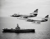 Two A-4C Skyhawk aircraft fly past anti-submarine aircraft carrier USS Kearsarge, 1964 Poster Print by Stocktrek Images - Item # VARPSTSTK500661A