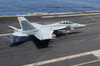 An F/A-18F Super Hornet lands on the flight deck of USS Nimitz Poster Print by Stocktrek Images - Item # VARPSTSTK107642M