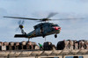 An MH-60S Sea Hawk lifts cargo from the fast combat support ship USNS Rainier Poster Print by Stocktrek Images - Item # VARPSTSTK105133M