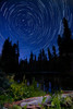 Star trails above Summit Lake in Lassen Volcanic National Park, California Poster Print by Dan Barr/Stocktrek Images - Item # VARPSTBRR200033S