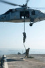 Sailors drop to the flight deck of USS Mobile Bay Poster Print by Stocktrek Images - Item # VARPSTSTK106669M
