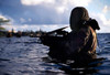 A Navy SEAL emerges from underwater during a training exercise Poster Print by Michael Wood/Stocktrek Images - Item # VARPSTWOD100021M