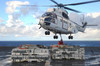 Sailors  attach cargo legs to an SA330J Puma helicopter Poster Print by Stocktrek Images - Item # VARPSTSTK108388M