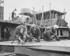 Three women chippers working in a shipbuilding shipyard Poster Print by Stocktrek Images - Item # VARPSTSTK500229A