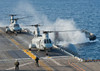 Two CH-46E Sea Knight helicopters on the flight deck of USS Bonhomme Richard Poster Print by Stocktrek Images - Item # VARPSTSTK106747M