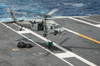 Sailors connect cargo legs and nets to an MH-60S Sea Hawk Poster Print by Stocktrek Images - Item # VARPSTSTK107833M