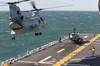 A CH-46E Sea Knight helicopter prepares to land on the flight deck aboard USS Kearsarge Poster Print by Stocktrek Images - Item # VARPSTSTK100758M A CH-46E Sea Knight helicopter prepares to land on the flight deck aboard USS Kearsarge Poster Print by Stocktrek Images - Item # VARPSTSTK100758M