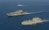 USNS Robert E Peary conducts a vertical replenishment with USS Bataan Poster Print by Stocktrek Images - Item # VARPSTSTK108391M