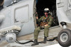 Naval Aircrewman acts in an SH-60B Sea Hawk helicopter Poster Print by Stocktrek Images - Item # VARPSTSTK106838M