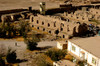 An Afghan National Army soldier walks near historic ruins within Alexander the Great's Castle in Afghanistan Poster Print by Stocktrek Images - Item # VARPSTSTK103661M