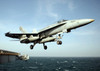 An F/A-18C Hornet clears the flight deck aboard aircraft carrier USS Harry S Truman Poster Print by Stocktrek Images - Item # VARPSTSTK100792M