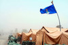 An Air Force flag in tent city waves in the fierce winds of a sand storm Poster Print by Stocktrek Images - Item # VARPSTSTK101059M
