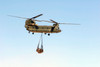 A CH-47 Chinook of the Royal Air Force transports a sling load of pallets Poster Print by Andrew Chittock/Stocktrek Images - Item # VARPSTACH100150M