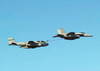 An F/A-18E Super Hornet performs an aerial refueling for an EA-6B Prowler Poster Print by Stocktrek Images - Item # VARPSTSTK100865M