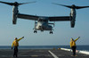 Aviation Boatswain's Mates direct an MV-22 Osprey as it launches from the flight deck Poster Print by Stocktrek Images - Item # VARPSTSTK107527M