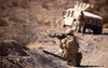 US Marine scans his area while on patrol Poster Print by Stocktrek Images - Item # VARPSTSTK105111M