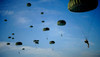 Soldiers descend under a parachute canopy during Operation Toy Drop Poster Print by Stocktrek Images - Item # VARPSTSTK102838M