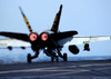 An F/A-18C Hornet lands on the flight deck aboard aircraft carrier USS Harry S Truman Poster Print by Stocktrek Images - Item # VARPSTSTK100829M