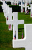 American flags rest in front of headstones at Madingley American Cemetery Poster Print by Stocktrek Images - Item # VARPSTSTK101057M