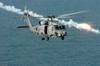 An SH-60B Seahawk fires-off flares Poster Print by Stocktrek Images - Item # VARPSTSTK100991M