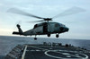 An SH-60F Seahawk helicopter prepares to land Poster Print by Stocktrek Images - Item # VARPSTSTK101441M