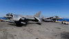 Flight deck personnel reposition AV-8B Harrier aircraft aboard USS Essex Poster Print by Stocktrek Images - Item # VARPSTSTK104945M