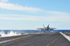 An F/A-18E Super Hornet launches from the flight deck of USS George Washington Poster Print by Stocktrek Images - Item # VARPSTSTK107721M