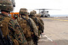 Marines and sailors progress to board a CH-53E Super Stallion Poster Print by Stocktrek Images - Item # VARPSTSTK101838M