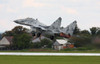 Slovak Air Force MIG-29 Fulcrum taking off Poster Print by Timm Ziegenthaler/Stocktrek Images - Item # VARPSTTZG100138M