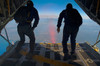 Members of the US Navy Parachute Team Leap Frogs jump above Huntington Beach Poster Print by Stocktrek Images - Item # VARPSTSTK108721M