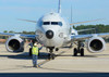 Aviation Electronics Technician prepares to launch a P-8A Poseidon Poster Print by Stocktrek Images - Item # VARPSTSTK108141M