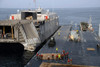 Vehicles are transferred aboard the high speed vessel Swift Poster Print by Stocktrek Images - Item # VARPSTSTK106925M