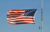 The American flag waves at half-mast Poster Print by Stocktrek Images - Item # VARPSTSTK105179M