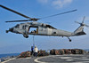 Sailors attach a cargo pennant to a MH-60S Sea Hawk helicopter Poster Print by Stocktrek Images - Item # VARPSTSTK104180M