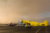 Three P-51 Mustangs parked on the ramp ahead of a storm Poster Print by Rob Edgcumbe/Stocktrek Images - Item # VARPSTRDG100088M