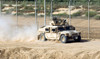 A M1114 Humvee patrols the perimeter of Joint Bae Balad, Iraq Poster Print by Stocktrek Images - Item # VARPSTSTK106053M