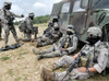 US Air Force and Army members take a rest after an air assault mission Poster Print by Stocktrek Images - Item # VARPSTSTK103837M