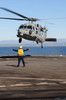 Boatswain??s Mate directs an MH-60S Sea Hawk helicopter on the flight deck of USS Comstock Poster Print by Stocktrek Images - Item # VARPSTSTK104057M Boatswain??s Mate directs an MH-60S Sea Hawk helicopter on the flight deck of USS Comstock Poster Print by Stocktrek Images - Item # VARPSTSTK104057M