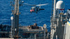 An MH-60S Sea Hawk delivers supplies to the flight deck of USS Mobile Bay Poster Print by Stocktrek Images - Item # VARPSTSTK106485M