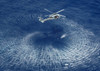 An MH-60S Knight Hawk prepares to retrieve Search and Rescue swimmers Poster Print by Stocktrek Images - Item # VARPSTSTK100550M