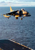 An AV-8B Harrier prepares to land on the flight deck of the amphibious assault ship USS Peleliu Poster Print by Stocktrek Images - Item # VARPSTSTK100244M