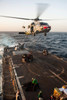 An MH-60S Sea Hawk helicopter delivers cargo to USS Mobile Bay Poster Print by Stocktrek Images - Item # VARPSTSTK106822M