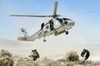 A HH-60H Seahawk departs after delivering Navy SEAL Team members Poster Print by Stocktrek Images - Item # VARPSTSTK100917M