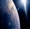 The Sun shining on planet Earth Poster Print by Stocktrek Images - Item # VARPSTSTK200561S