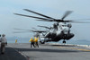 A Marine MH-53 helicopter takes off from the flight deck of USS Essex Poster Print by Stocktrek Images - Item # VARPSTSTK105671M