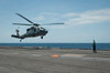 An MH-60S Sea Hawk prepares to land on the flight deck of USS Nimitz Poster Print by Stocktrek Images - Item # VARPSTSTK107615M