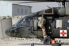 A UH-60 Blackhawk Medivac helicopter refuels at Camp Warhorse after a mission Poster Print by Terry Moore/Stocktrek Images - Item # VARPSTTMO100059M