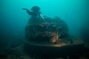 Diver exploring the forward gun turret of the British HMS Audacious battleship wreck Poster Print by Steve Jones/Stocktrek Images - Item # VARPSTSJN400771U