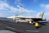 An F/A-18C Hornet launches from the flight deck aboard USS Nimitz Poster Print by Stocktrek Images - Item # VARPSTSTK104545M
